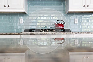 Red Kettle glass backsplash subway tile kitchen