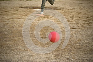 Red kickball approach photo