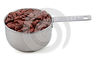 Red kidney beans in a measuring cup