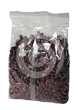 red kidney beans in a plastic bag isolated on a white background
