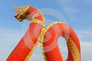 Red King of serpent statue