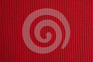 Red knitted fabric texture as background