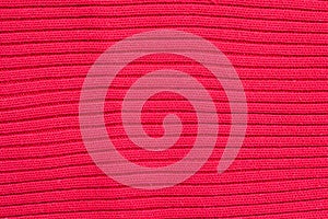 Red knitted wool texture