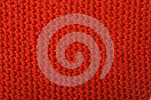 Red knitted wool texture can use as background.