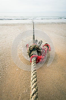 Red knotted ships rope 7