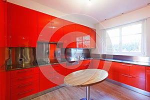 Modern kitchen lacquered with red