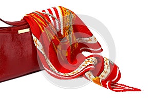 Red ladies' handbag and scarf isolated on white