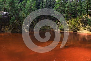 Red lake. One of the four colored lakes at the foot of the Wielka Kopa mountain