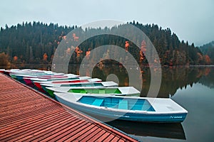 Boats on the Red Lake in Romania. Late autumn