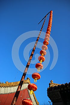 Red lantern hang at the high pole