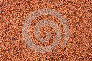 Red laterite gravel texture for background