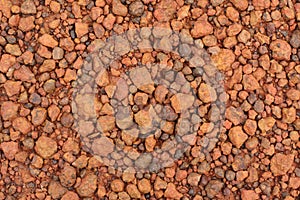 Red laterite gravel texture for background