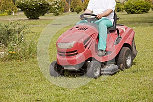 Red Lawn mower cutting grass