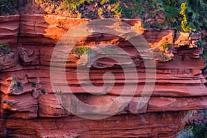 Red layered cliffs of Scotland`s South-East coast