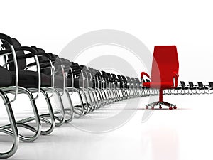 Red leader chair with large group of black chairs