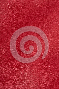 Red leather background macro photo. Red leather texture vertical photo