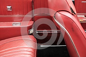 Red leather interior of an American car of the sixties in Wettenberg, Germany