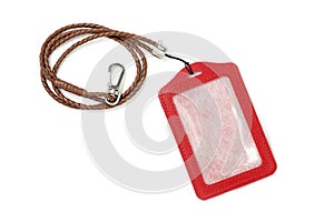 Red leather label tag with string, isolated on the white background.