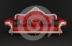 Red leather sofa with cushions