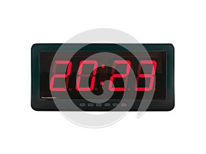 Red led light numbers 2023 illuminated on black digital electric alarm clock display