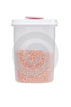 Red lentils in a plastic container