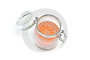 Red lentils stored inside the closable glass