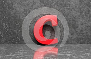 Red letter C on concrete wall an floor background