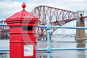 Red letterbox and Firth of Forth rail bridge