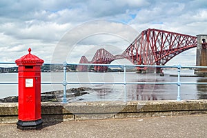 Red letterbox and Firth of Forth rail bridge