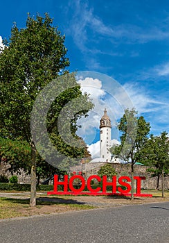 Red lettering Hoechst in front of the castle, Frankfurt, Germany