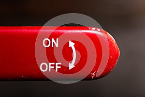 the red lever on off switch dark background