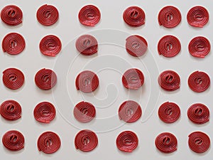 Red licorice candies pattern