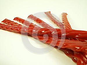 Red Licorice Ropes Fanned Out Isolated on White