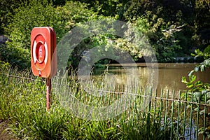 Red Life Buoy Ring by Lake