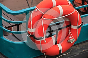 red life buoys on board the ship