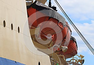 Red lifeboats closeup