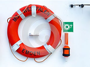 Red lifebuoy on a ferry from Eemshaven, Netherlands to Borkum Germany