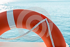 Red lifesaver on a boat