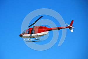 Red light helicopter in flight