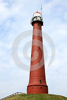 Red lighthouse along the dutch coast, IJmuiden