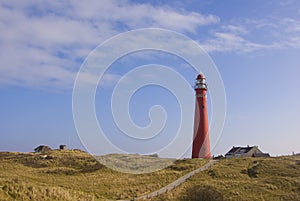 Red Lighthouse in Dunes at Schiermonnikoog photo