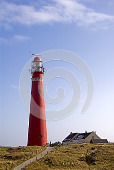 Red Lighthouse in Dunes at Schiermonnikoog photo