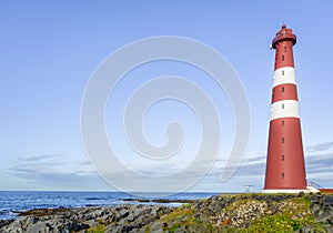 Red lighthouse in Finnmark, Northern Norway