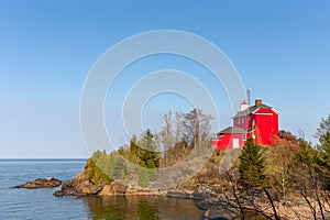 Red Lighthouse on Lake Superior in Upper Michigan