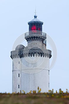 Red lighthouse lighted
