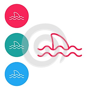 Red line Shark fin in ocean wave icon isolated on white background. Set icons in circle buttons. Vector