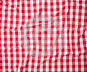 Red linen crumpled tablecloth texture