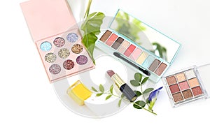 red lip and Set of decorative fashion beauty cosmetics with colors Pastel of spring set collection on white