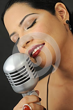 Red lips beauty singing with retro mic