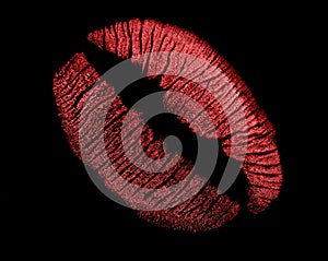 Red lips imprint on black photo